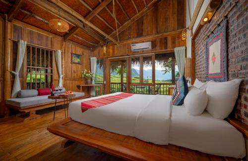 Letto o letti in una camera di Puluong Retreat