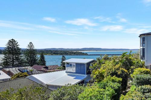 a house with a view of the water at The Sea Serenade in Blacksmiths