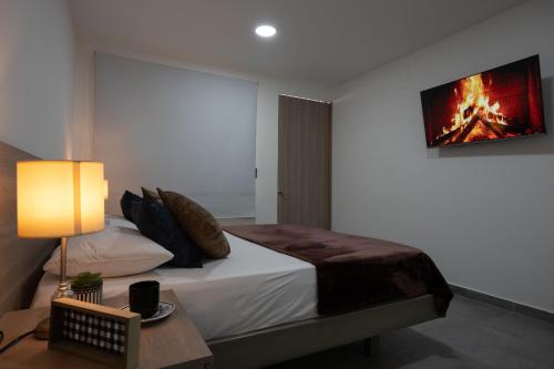 Cama o camas de una habitación en Finca hotel nuevo futuro