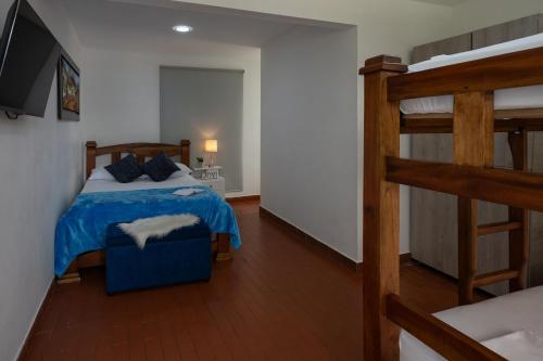 Cama o camas de una habitación en Finca hotel nuevo futuro