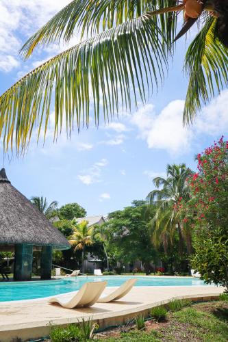 a view of the pool at the resort at Beach Retreat by C in Bain Boeuf