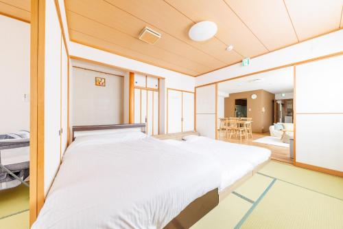 Katil atau katil-katil dalam bilik di STAY IN OTARU