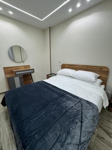 Ένα ή περισσότερα κρεβάτια σε δωμάτιο στο Luxury 1Bed Close To Cairo Airport With Fast WiFi