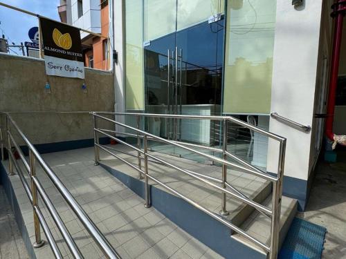 a metal railing on the side of a building at Almond Suites by Hiverooms in Cebu City