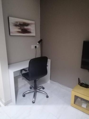 Televisyen dan/atau pusat hiburan di City Apartment T1 - Cassenda - Airport