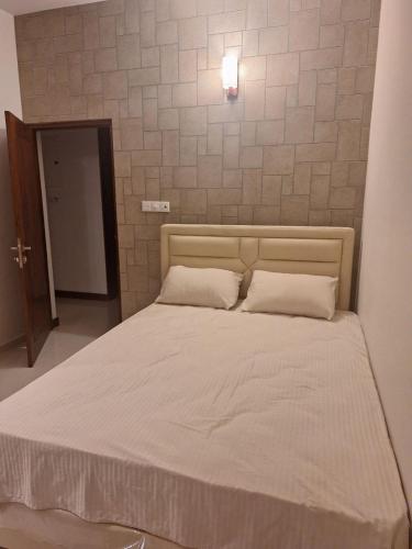 Ένα ή περισσότερα κρεβάτια σε δωμάτιο στο 5-star Luxury House at Pitakotte