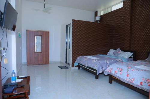 Fotografie z fotogalerie ubytování Mohanam Pure Vegetarian Restaurant v destinaci Nagercoil