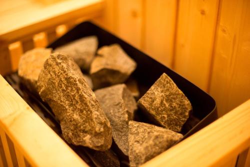 a crate full of rocks sitting on a table at Lam Giang Hotel in Vinh