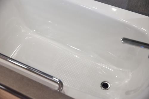a close up of a white bathroom sink at Hotel Collective in Naha