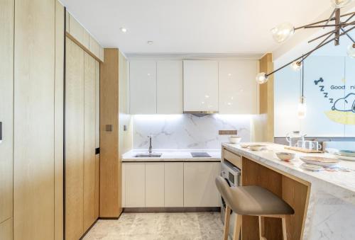 Una cocina o zona de cocina en 三亚天成中央海岸海景酒店