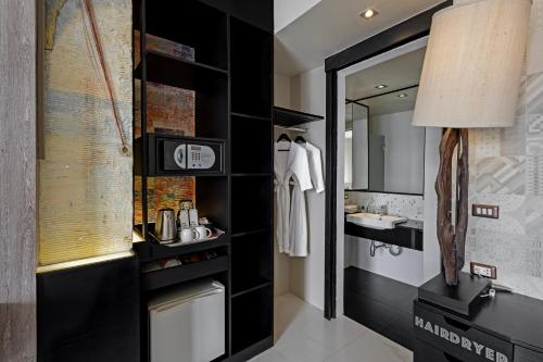 Η κουζίνα ή μικρή κουζίνα στο Siam At Siam Design Hotel Bangkok