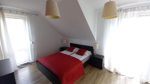 House between Cracow and Wieliczkaにあるベッド