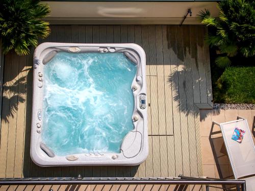 a swimming pool on the side of a house at City Hotel Merano in Merano