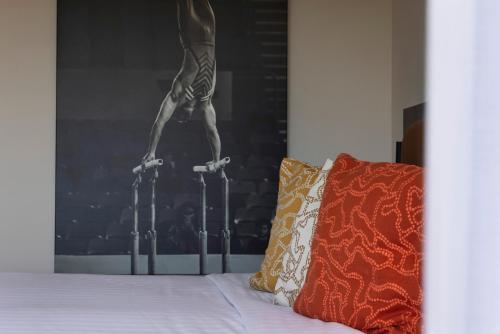 Kfar Maccabiah Business & Sport Hotelにあるベッド