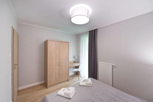 Katil atau katil-katil dalam bilik di APARTAMENTY MIERZEJA - Stegna Forest, blisko lasu, Bezpłatny Meleks