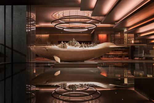 a museum with a large bath tub in a room at Grand Hyatt Changsha-Close to Helong Sports Center in Changsha