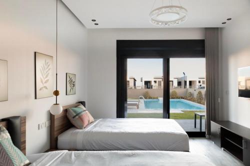 Swimmingpoolen hos eller tæt på The Grand Oasis Villa