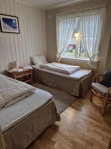 Postel nebo postele na pokoji v ubytování Apartment, Rekkedal Gjestegard - Sæbø