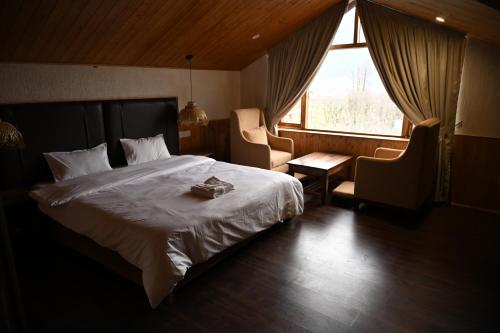 Cama o camas de una habitación en Odbostays Manali