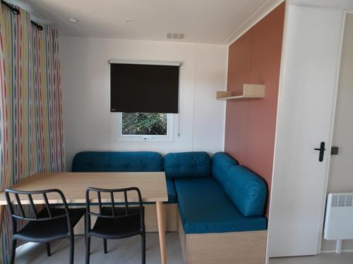 Ruang duduk di Camping Les Sables Blancs