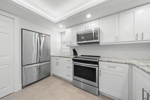 Una cocina o zona de cocina en Sanddollar #A201