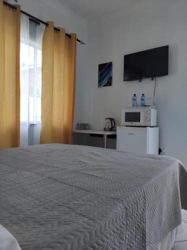 Ένα ή περισσότερα κρεβάτια σε δωμάτιο στο Claremont Secured unit