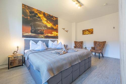 เตียงในห้องที่ Neue Ferienwohnung Die Piratenbucht Ostsee