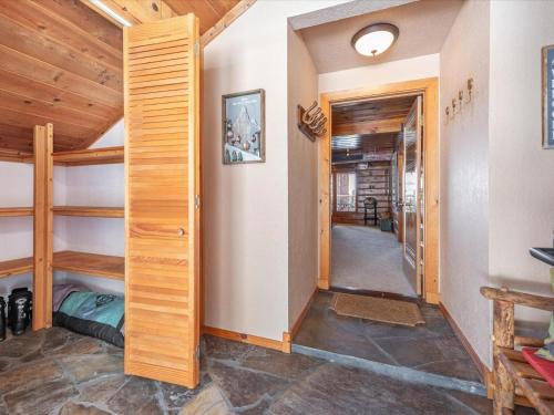 a hallway in a house with a vaulted ceiling at JJs Lakeview Chalet in Tahoe Vista