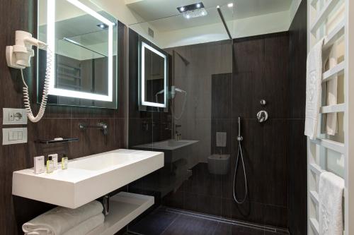 Koupelna v ubytování Hotel Tiferno