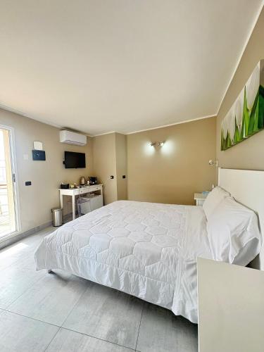 Postel nebo postele na pokoji v ubytování ALDIVA ROOMS