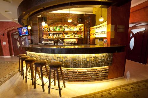 Lounge nebo bar v ubytování VisPas Hotel