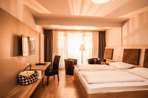 Postel nebo postele na pokoji v ubytování Simon - das Vitalhotel