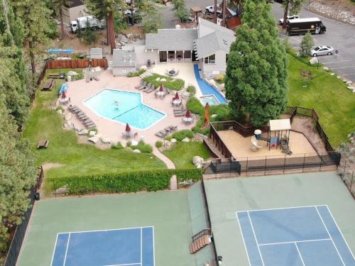 an aerial view of a backyard with a pool at Chimney Rock Condo condo in Stateline