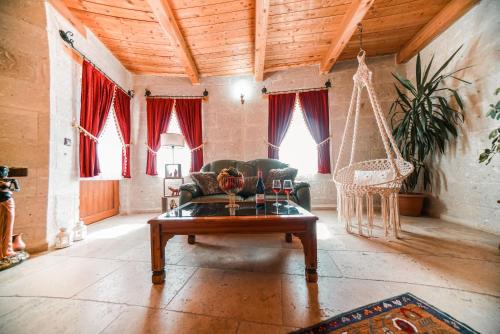 Posezení v ubytování Zeus Cave Suites