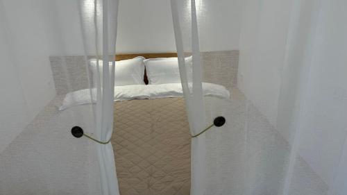Postel nebo postele na pokoji v ubytování Laguna Batumi Apart