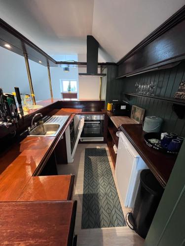 a kitchen with a sink and a counter top at Top Deck in Killorglin