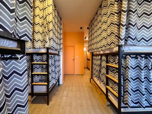 a room with shelves of different types of ties at Nomads Hostel in Dahab