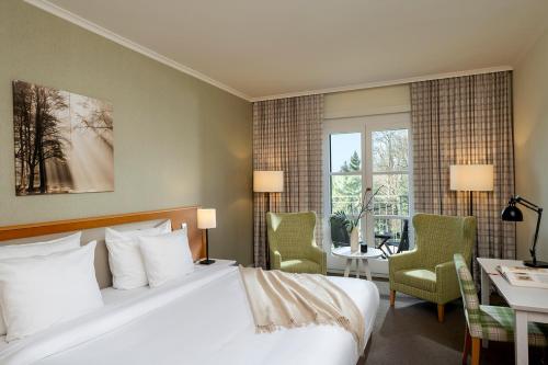 Postel nebo postele na pokoji v ubytování Precise Resort Scharmützelsee - Golf & SPA