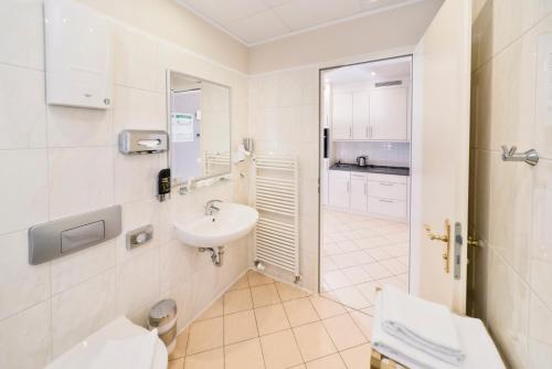 Koupelna v ubytování AMC Apartments - Ku'Damm