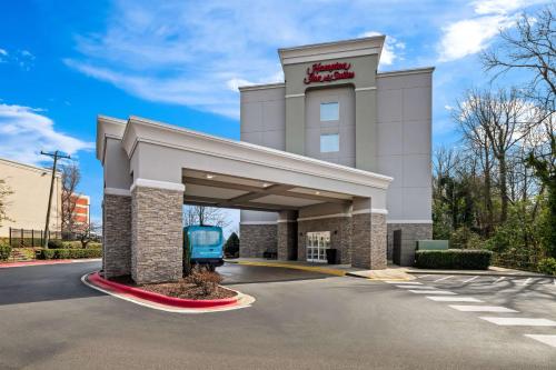 a rendering of a mobil gas station at Hampton Inn & Suites Charlotte-Airport in Charlotte