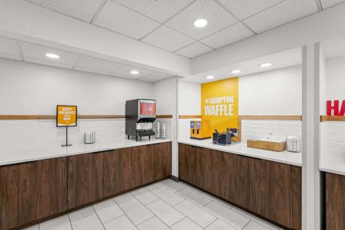 a waiting room at a k rite aid pharmacy at Hampton Inn & Suites Charlotte-Airport in Charlotte