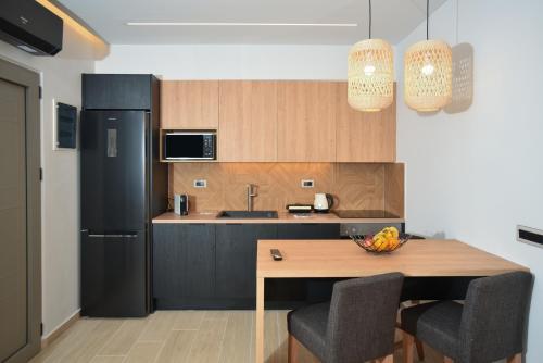 Kuchyň nebo kuchyňský kout v ubytování Almy Beach Hotel