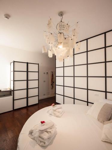 Quercia Belvedere Relaisにあるベッド