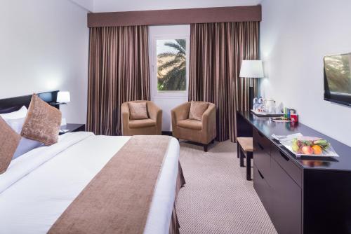 Ένα ή περισσότερα κρεβάτια σε δωμάτιο στο Best Western Sur