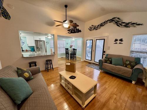 a living room with a couch and a table at Ocean Lakes Golf Cart Pet Friendly 1648 in Myrtle Beach