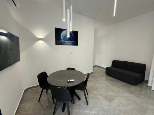 Μια τηλεόραση ή/και κέντρο ψυχαγωγίας στο Matera's Home by Dimorra