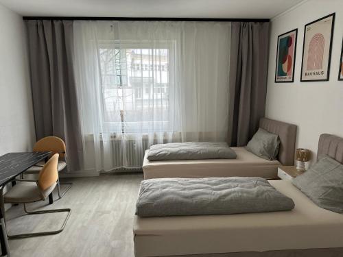 Katil atau katil-katil dalam bilik di Primestay Studios Parking Wifi Kitchen