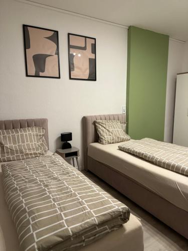 Katil atau katil-katil dalam bilik di Primestay Studios Parking Wifi Kitchen