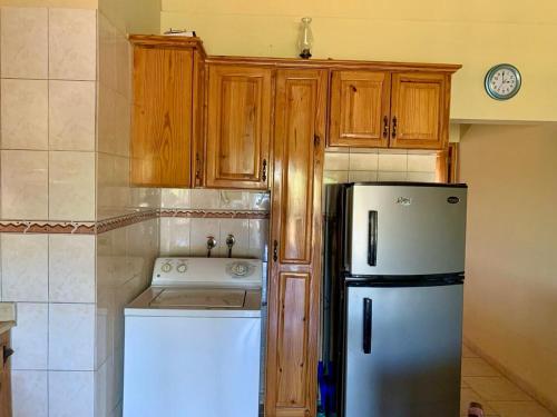 Kuchyň nebo kuchyňský kout v ubytování Condo Sosúa