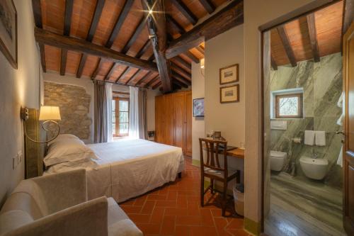 Postel nebo postele na pokoji v ubytování Ultimo Mulino Country Hotel